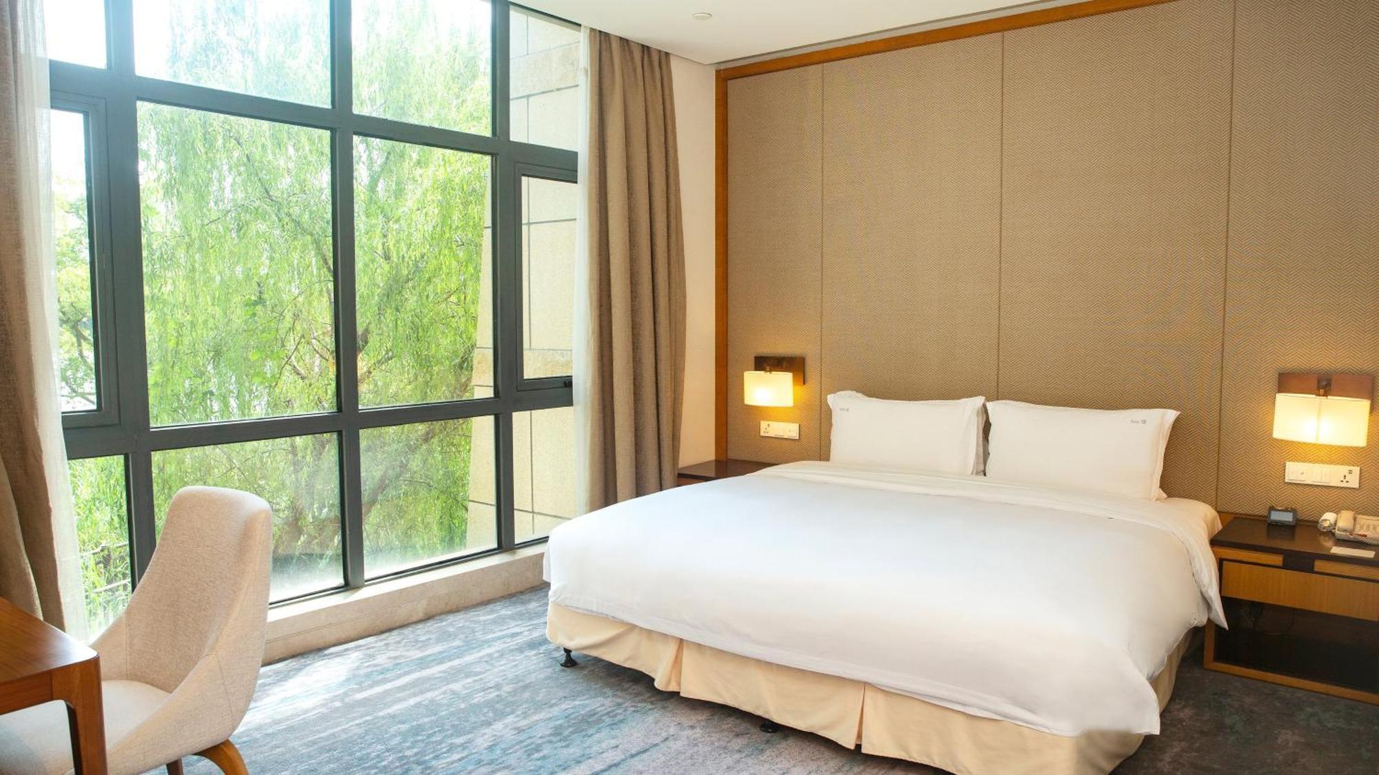 Holiday Inn Kunshan Huaqiao By Ihg Buitenkant foto